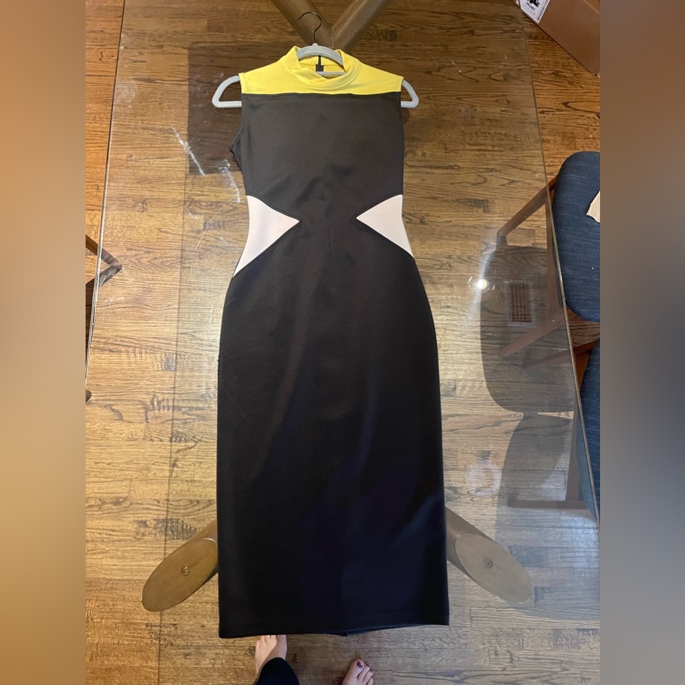 Mid- calf, high neckline, sleeveless dress